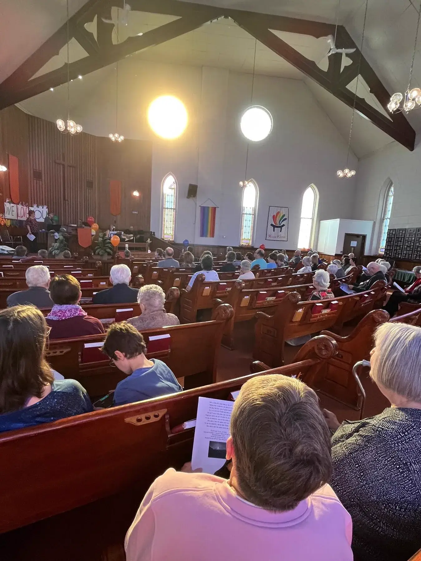 The congregation gathered for worship in the historic sanctuary