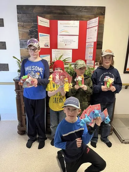Young people delivering care crafts around Boissevain